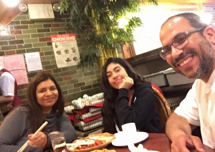 Aminah Nieves with her dad and mom