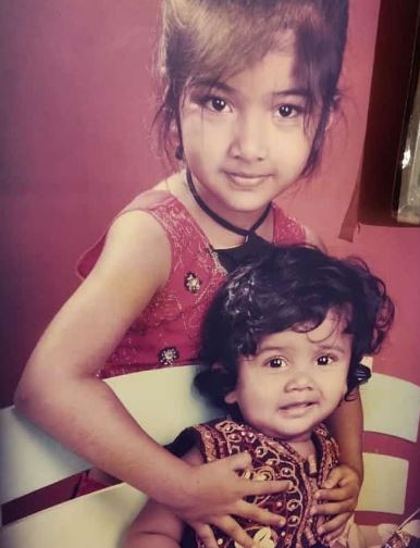 Amrutha Prem childhood image with her brother