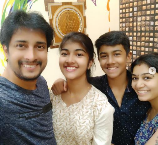 Amrutha Prem with her father mother and brother