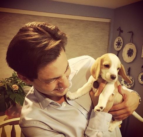 An old photo of Dax with his pet dog