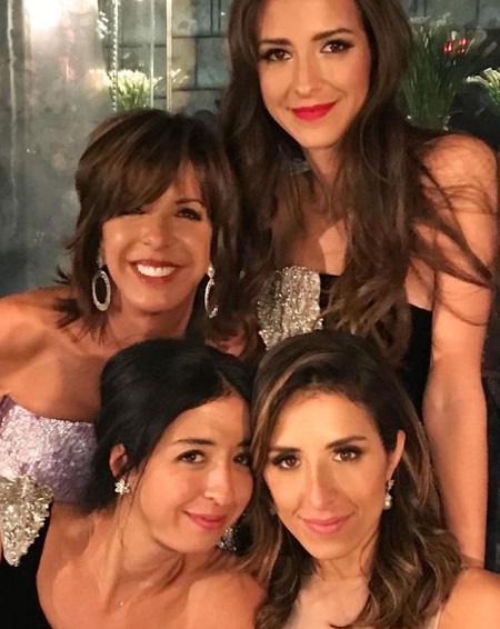Arielle Charnas with her mother and two sisters
