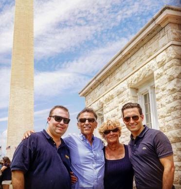Dax with his parents and brother