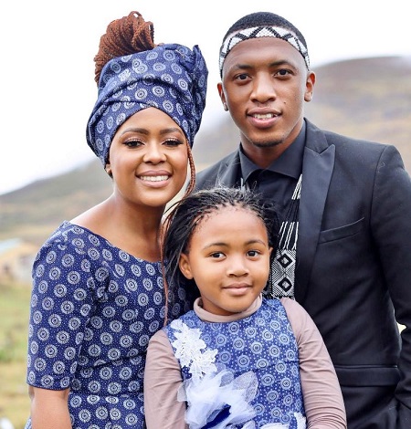 Dumi Mkokstad with his wife and daughter