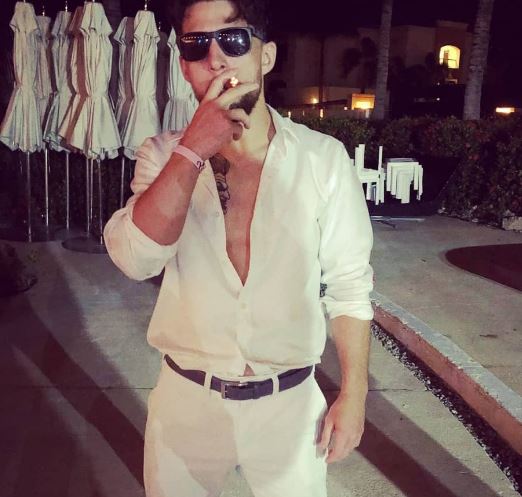 Jay Perrin smokes cigratte