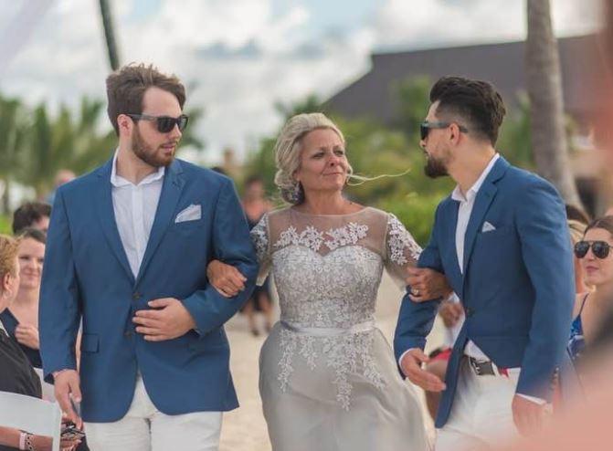 Jay Perrin with his mother and brother