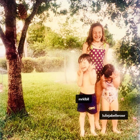 Kate Chastain with her siblings durign childhood