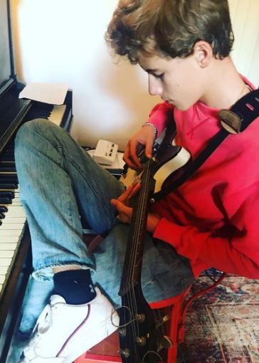 Sam Nivola loves playing Guitar
