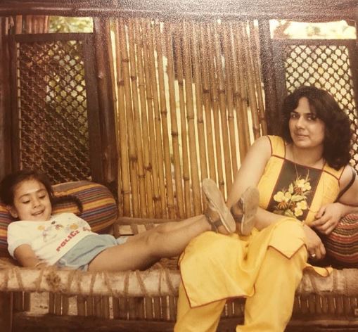 Young Tina with her mother Asha Thadani