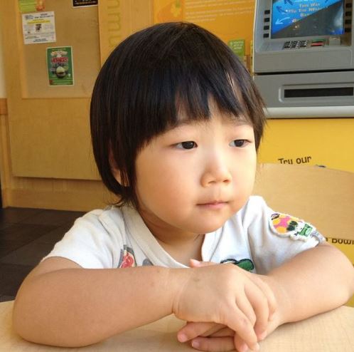 Childhood photo of Reyn