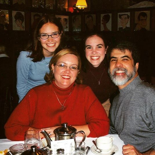 Chris Ledesma with his wife and daughters