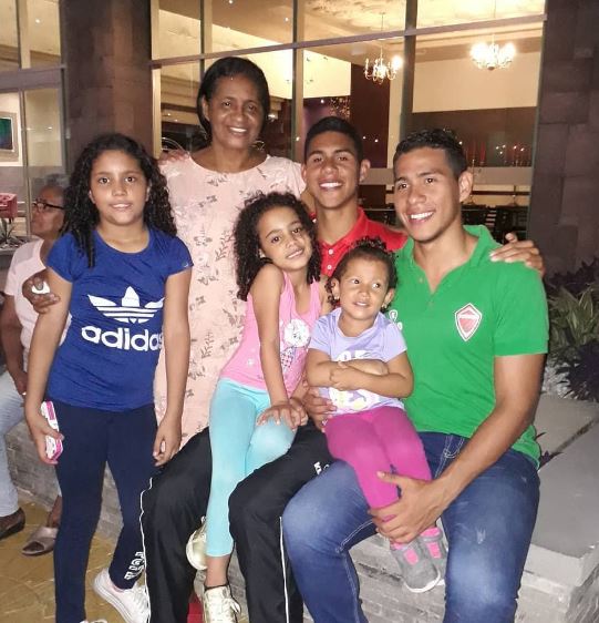 Devis with his family