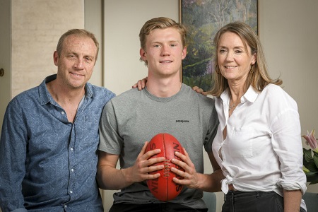 Fischer McAsey with his parents