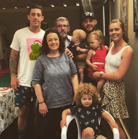 Jordy Sandy with family members