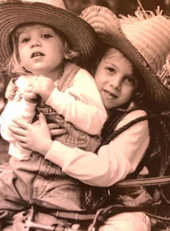 Riley Keough childhood image with her younger brother