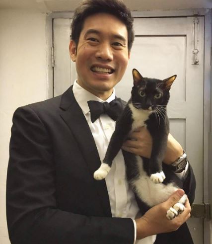 Timothy with his pet cat