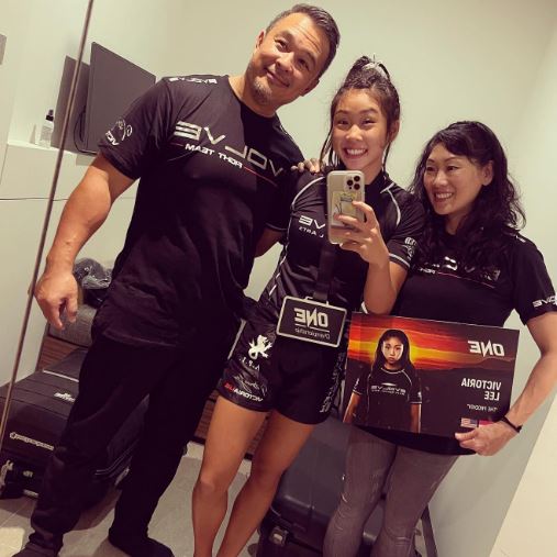 Victoria Lee with her father and mother