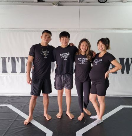 Victoria Lee with her sister and brothers