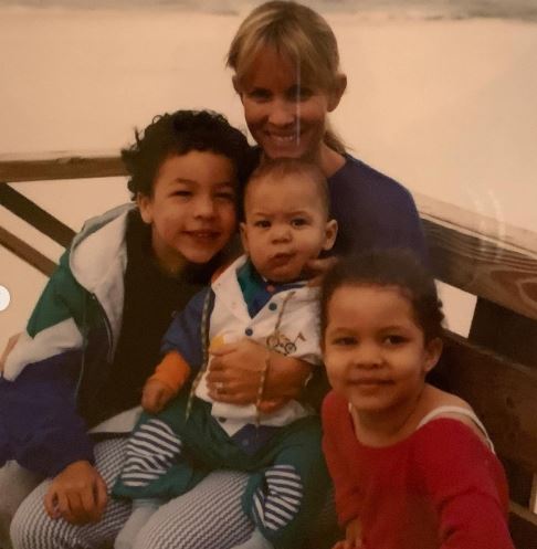 Young Callie with her mom and siblings
