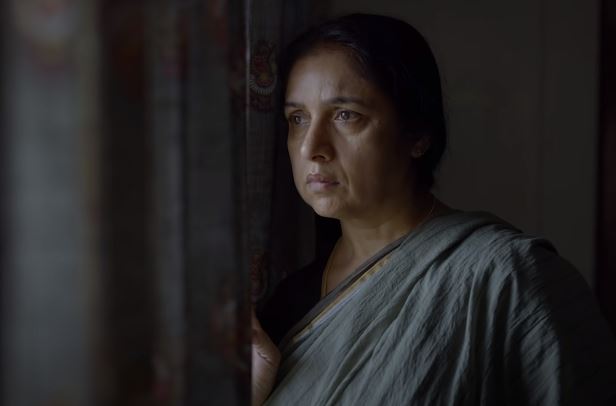 Actress Revathi as Asha
