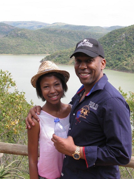 Anele Tembe with her father at their home