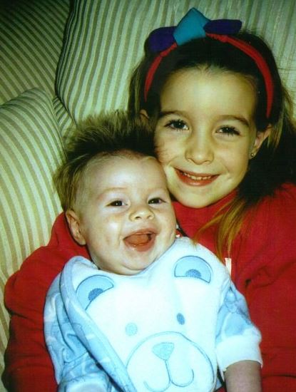 Childhood photo of Evan with his sister Erin McClintock
