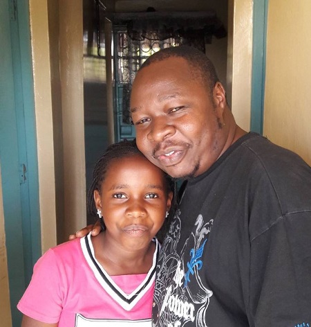 DJ Lastborn with daughter