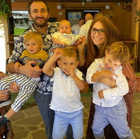 Elena Franchini with her husband and kids