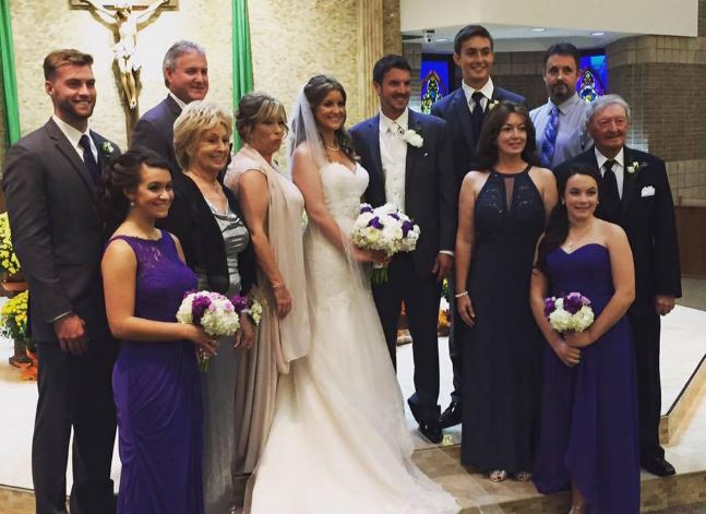 Evan with his family at his sister Erin's wedding