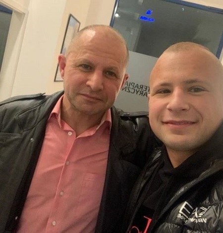 Jacek Murański with his son
