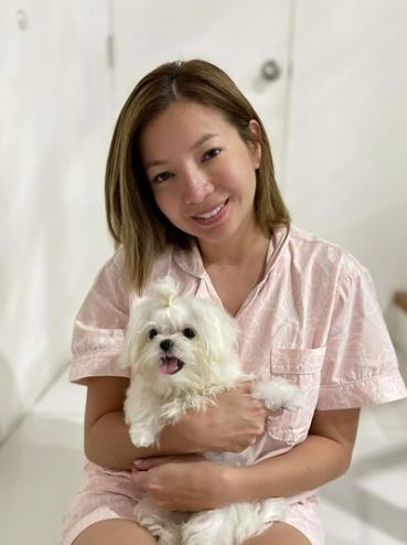 Maui Taylor with her pet dog