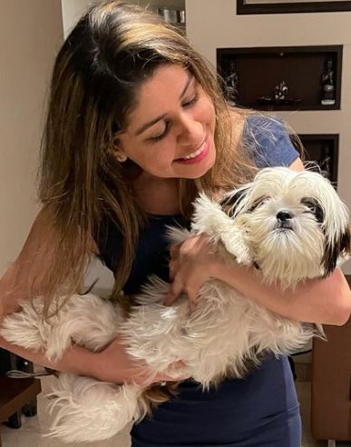Neha Saroopa and her pet dog