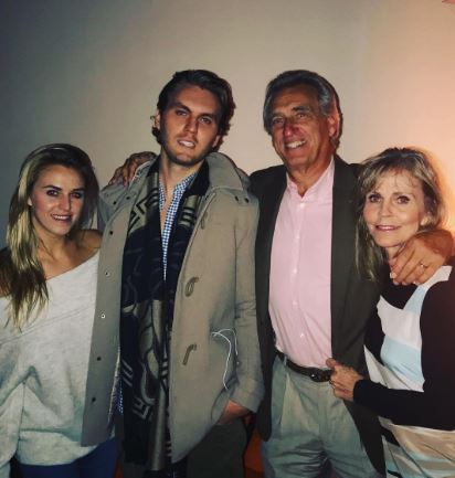 Olivia Flowers with her father mother and brother