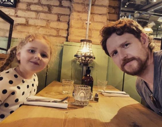 Ross with his daughter