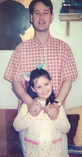 Shaughna Phillips old image with his dad