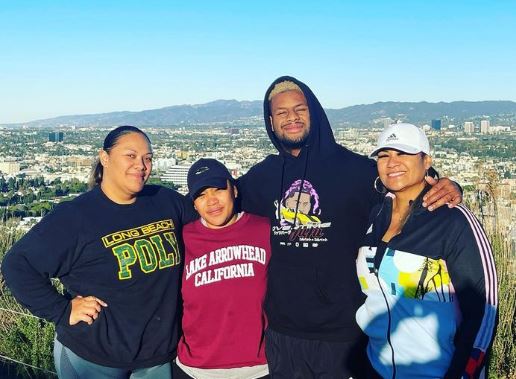 Smith with his family
