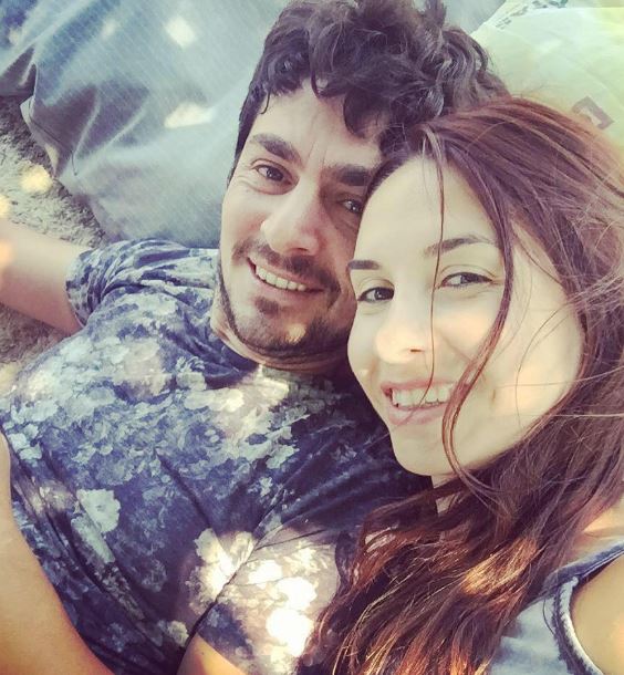 Taner Savut with his wife