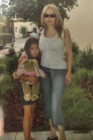 Childhood photo of Daisy with her mother