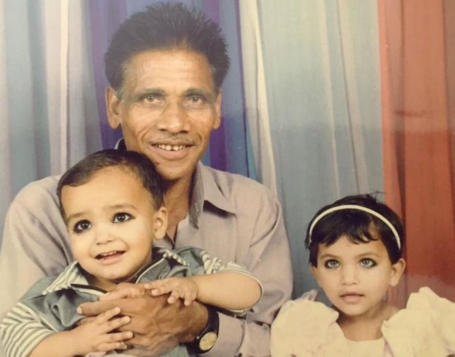 Childhood photo of Lakhan with his grandfather and sister Kirti