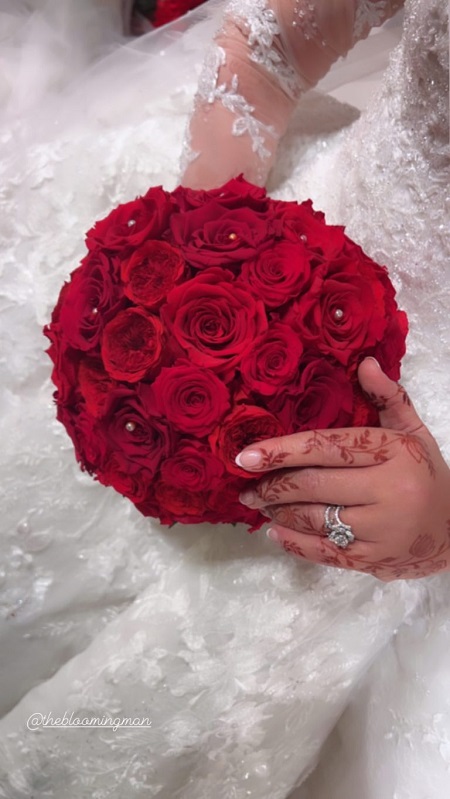 Ebraheem Al Samadi wife holding Forever Rose Bouque