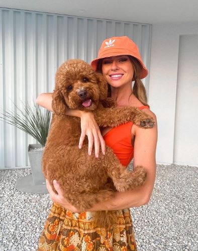Raquel with her pet dog