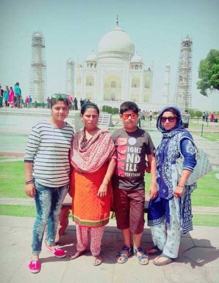 Saika Ishaque with her mother and brother