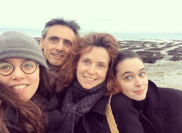 Solen with her husband Christophe Roy, daughters Lilas Roy and Valentine Roy