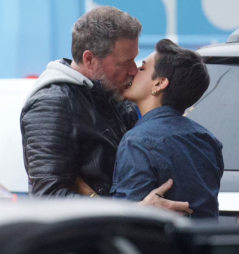 Dean McDermott shared a kiss with Lily Calo