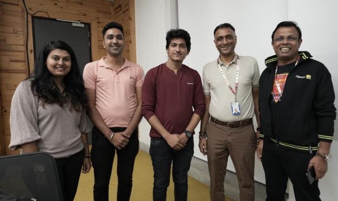 Kalyan Krishnamurthy with his staff