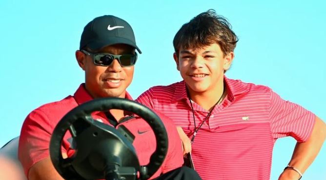 Charlie Woods and his dad Tiger Woods
