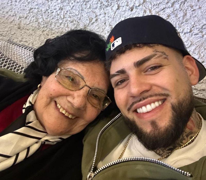 Gino Mella with his mother