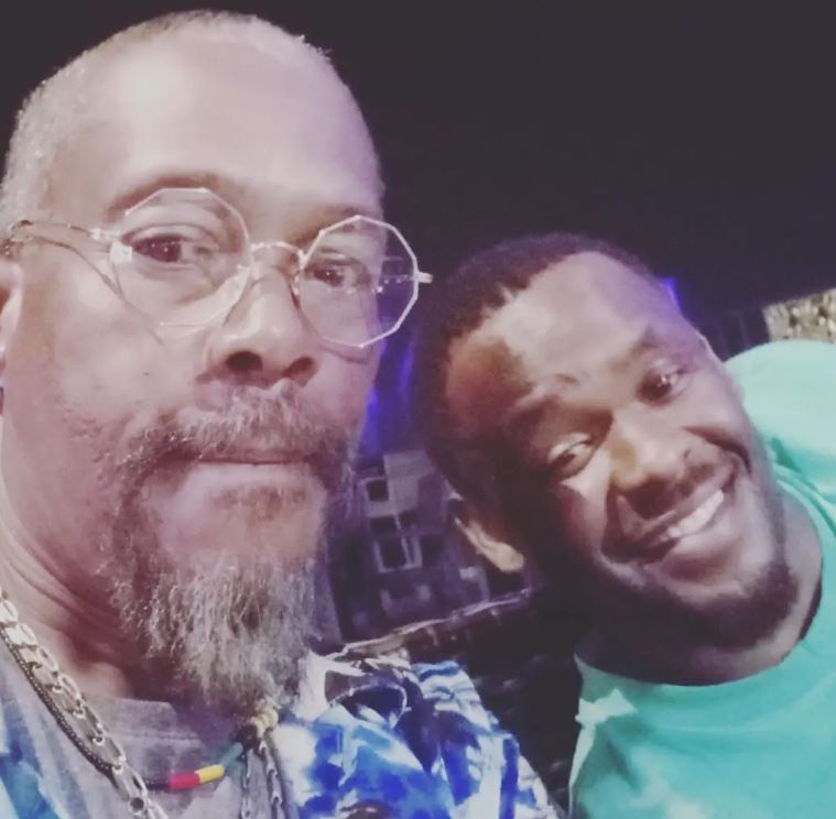 Hanks Anuku with his friend