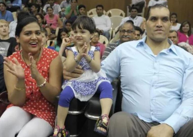 Harminder Kaur with her husband The Great Khali and daughter