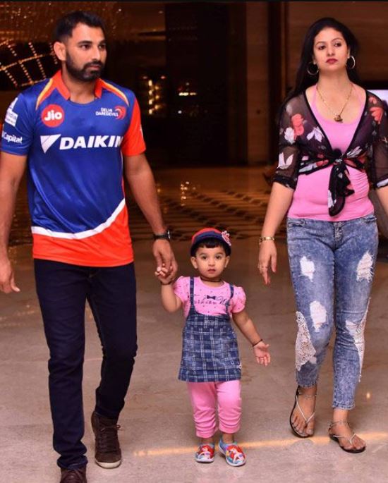 Hasin Jahan and Mohammed Shami with their daughter