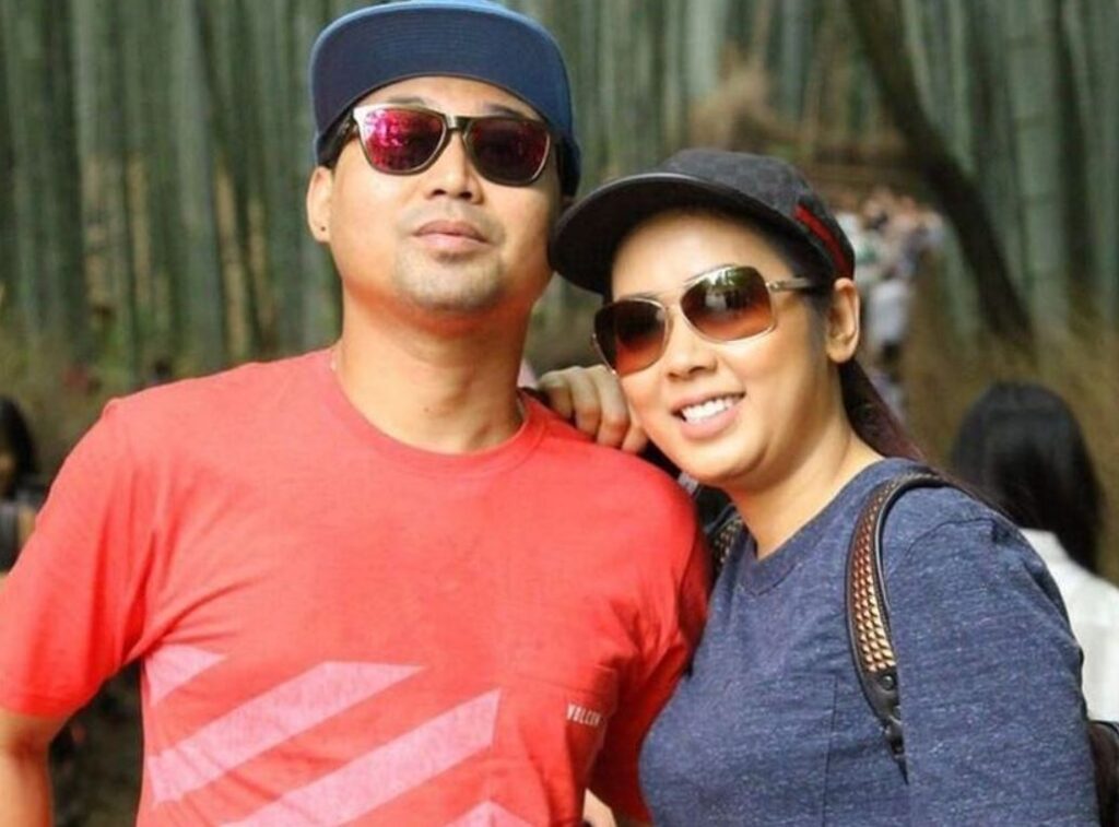 Herwan Prandoko with his wife Soimah Pancawati
